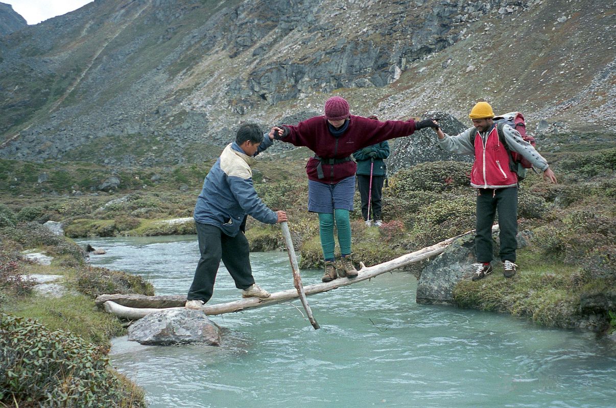 01 Jan Getting Help Balancing On A Log To Cross A Stream